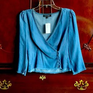 Intermix brand. Denim side closure blouse, Size 8 but it runs small.